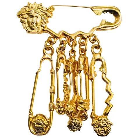 versace safety pins|versace brooch.